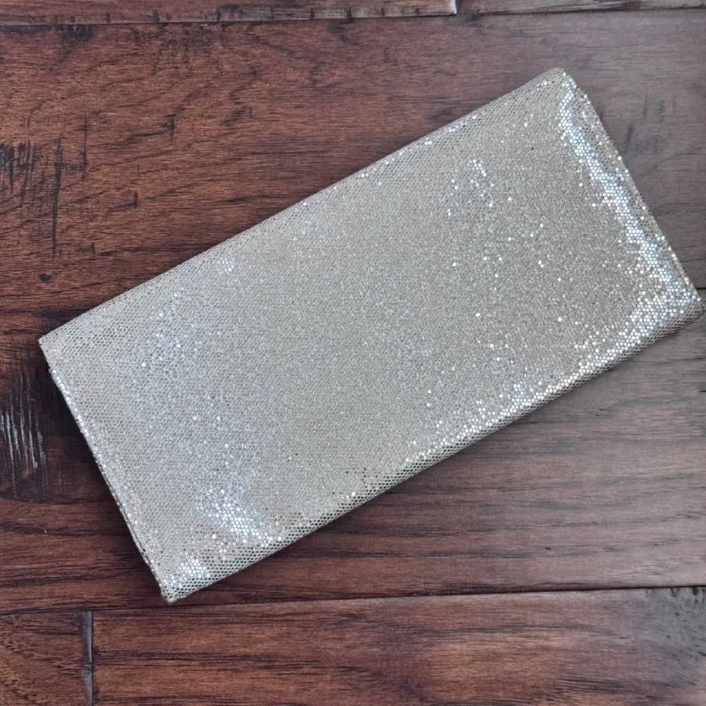 NWOT!  VICTORIA’S SECRET The Sexiest on Earth Sparkly Silver Clutch